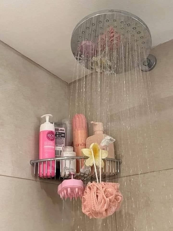 Luxury shower self care aesthetic with loofah, skincare essentials and modern bathroom setup